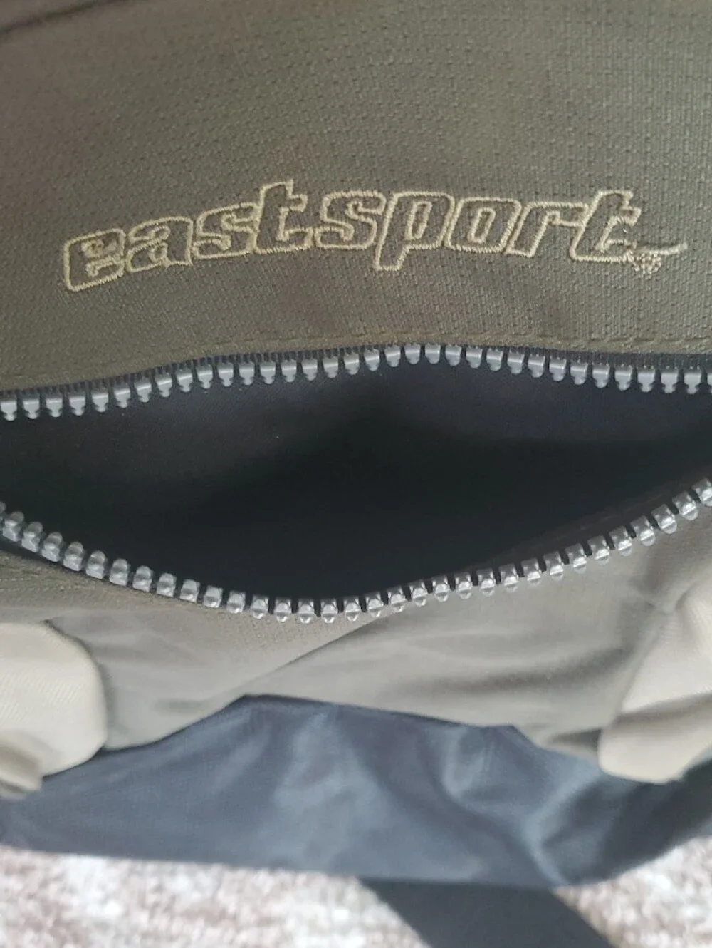 Eastsport Olive and Tan Sling Backpack. Multiple Pockets